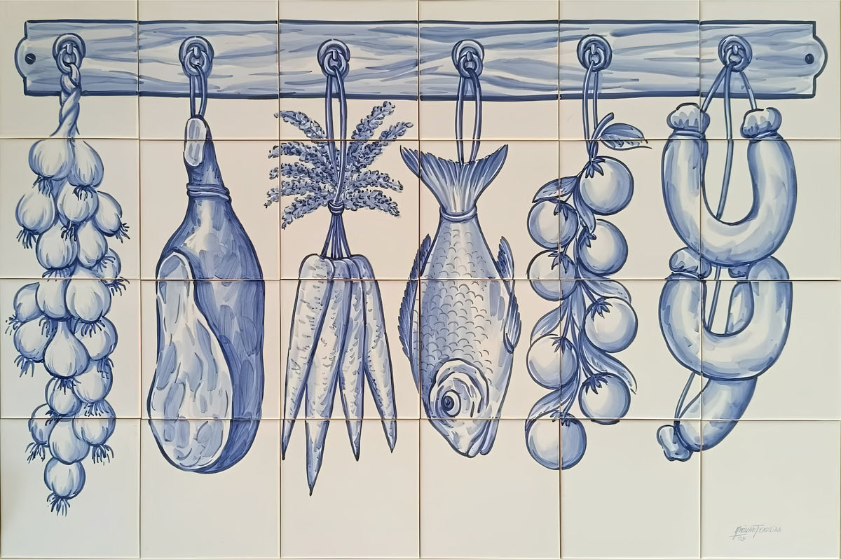 Blue and white Portuguese tile wall mural for kitchen splashback featuring a culinary illustration of various vegetables and meats hanging from hooks on a wooden rack, including garlic, ham, carrots, a fish, tomatoes, and sausages.