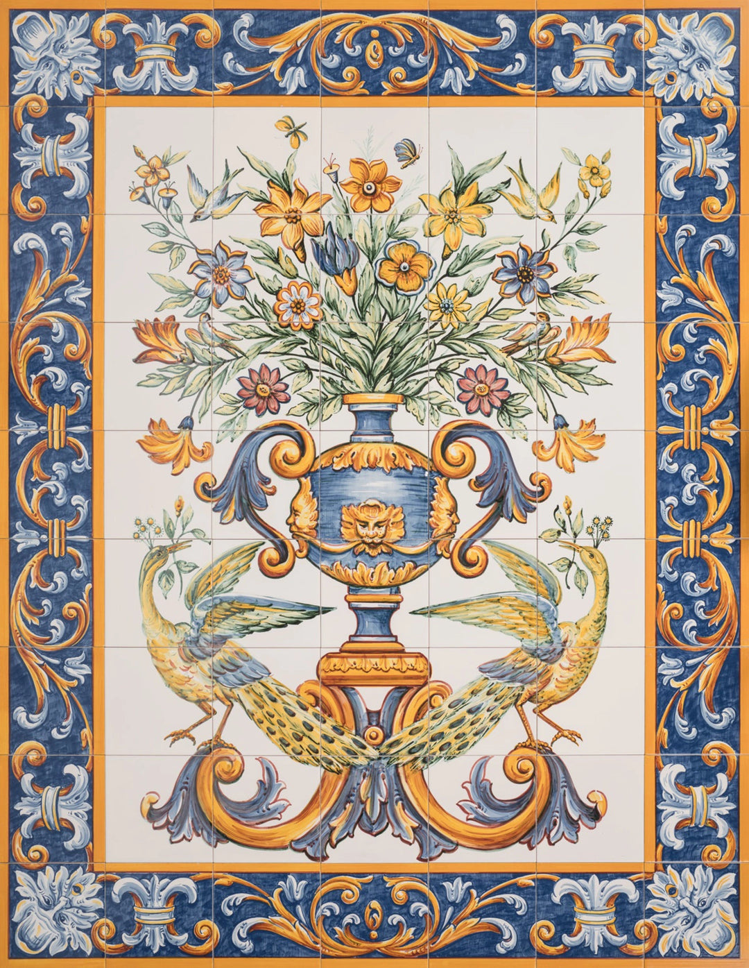 A hand-painted tile mural featuring a vase of flowers with a blue and gold floral pattern on a yellow background, and ornate borders.